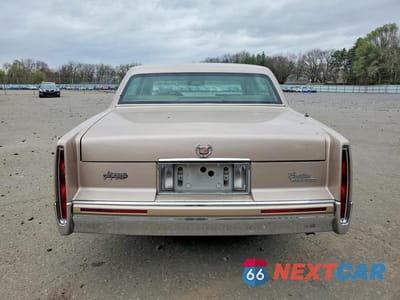 Zdjęcie 6 z 12 samochodu: 1993 CADILLAC DEVILLE VIN:1G6CD53B4P4215592 - miniatura