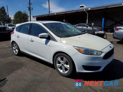 Czwarte zdjęcie samochodu z boku: 2016 FORD FOCUS SE VIN:1FADP3K27GL263985 - miniatura