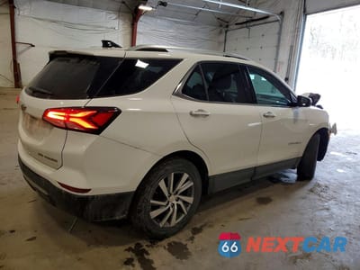 Trzecie zdjęcie samochodu z tyłu: 2022 CHEVROLET EQUINOX PREMIER VIN:3GNAXXEV3NS207311 - miniatura