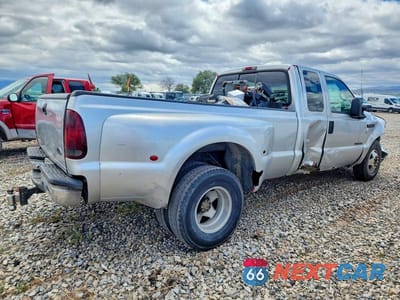 Czwarte zdjęcie samochodu z boku: 2000 FORD F350 SUPER DUTY VIN:1FTWX32F0YEB05869 - miniatura