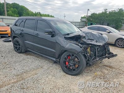 Czwarte zdjęcie samochodu z boku: 2012 JEEP GRAND CHEROKEE SRT-8 VIN:1C4RJFDJ1CC173779 - miniatura