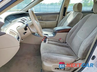 Zdjęcie 7 z 13 samochodu: 2003 TOYOTA AVALON XL VIN:4T1BF28B13U273935 - miniatura