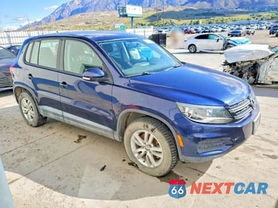 Czwarte zdjęcie samochodu z boku: 2012 VOLKSWAGEN TIGUAN S VIN:WVGAV7AX1CW551464 - miniatura