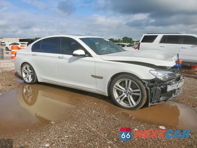 Czwarte zdjęcie samochodu z boku: 2014 BMW 740 I VIN:WBAYA6C50ED144154 - miniatura