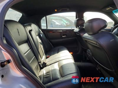 Zdjęcie 10 z 12 samochodu: 2002 LINCOLN TOWN CAR EXECUTIVE VIN:1LNHM81W12Y661352 - miniatura