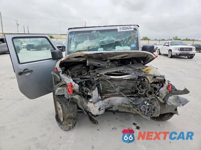 Piąte zdjęcie samochodu w środku: 2015 JEEP WRANGLER SPORT VIN:1C4GJWAG9FL706711 - miniatura