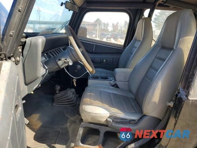 Zdjęcie 7 z 11 samochodu: 1994 JEEP WRANGLER / YJ S VIN:1J4FY19P9RP452519 - miniatura