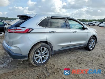 Trzecie zdjęcie samochodu z tyłu: 2019 FORD EDGE TITANIUM VIN:2FMPK3K96KBB42727 - miniatura