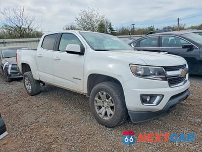 Czwarte zdjęcie samochodu z boku: 2019 CHEVROLET COLORADO LT VIN:1GCGTCENXK1137536 - miniatura