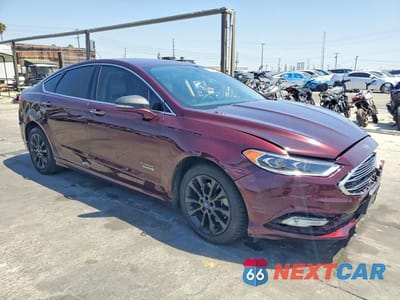 Czwarte zdjęcie samochodu z boku: 2017 FORD FUSION TITANIUM PHEV VIN:3FA6P0SUXHR275799 - miniatura