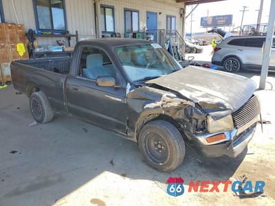 Czwarte zdjęcie samochodu z boku: 1997 TOYOTA TACOMA BASE VIN:4TANL42N5VZ249454 - miniatura