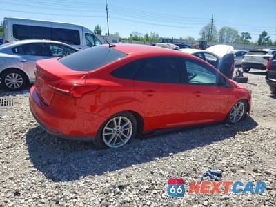 Trzecie zdjęcie samochodu z tyłu: 2016 FORD FOCUS SE VIN:1FADP3F25GL365294 - miniatura