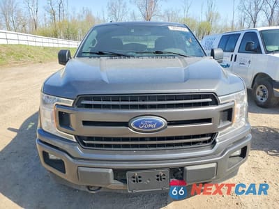 Piąte zdjęcie samochodu w środku: 2018 FORD F150 SUPERCREW VIN:1FTFW1E58JKE09842 - miniatura