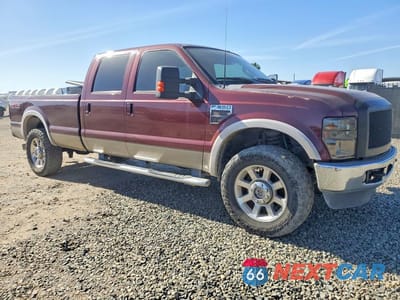 Czwarte zdjęcie samochodu z boku: 2010 FORD F350 SUPER DUTY VIN:1FTWW3BRXAEB30667 - miniatura