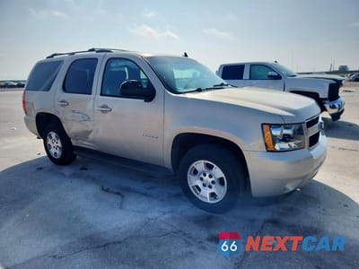 Czwarte zdjęcie samochodu z boku: 2011 CHEVROLET TAHOE VIN:1GNSCAE02BR144685 - miniatura