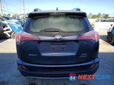 Zdjęcie 6 z 14 samochodu: 2018 TOYOTA RAV4 HYBRID XLE VIN:JTMRJREV8JD201216 - miniatura