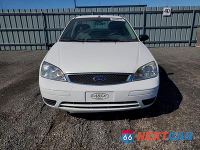 Piąte zdjęcie samochodu w środku: 2007 FORD FOCUS ZX4 VIN:1FAFP34N27W354435 - miniatura