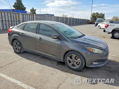 Czwarte zdjęcie samochodu z boku: 2017 FORD FOCUS SE VIN:1FADP3FE2HL276682 - miniatura
