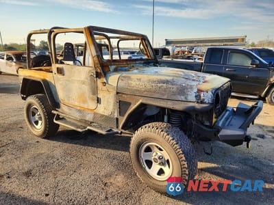 Czwarte zdjęcie samochodu z boku: 2000 JEEP WRANGLER / TJ SPORT VIN:1J4FA49S3YP731800 - miniatura