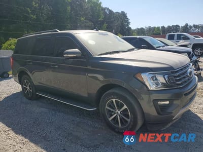 Czwarte zdjęcie samochodu z boku: 2018 FORD EXPEDITION XLT VIN:1FMJU1HTXJEA06126 - miniatura