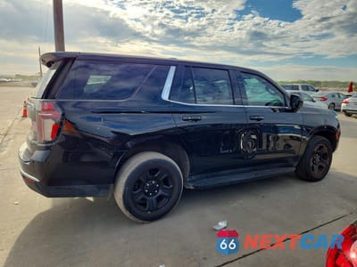 Trzecie zdjęcie samochodu z tyłu: 2023 CHEVROLET TAHOE C1500 VIN:1GNSCLED5PR493409 - miniatura