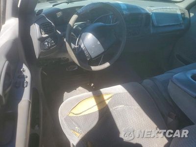 Zdjęcie 8 z 12 samochodu: 1999 FORD F150 VIN:1FTRX17W1XNA12738 - miniatura