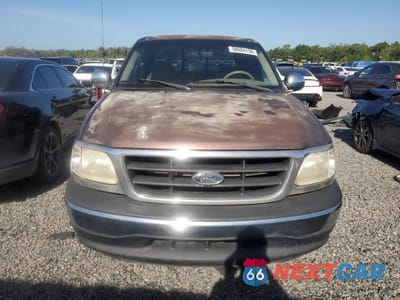 Piąte zdjęcie samochodu w środku: 2001 FORD F150 SUPERCREW VIN:1FTRW07L11KD66626 - miniatura