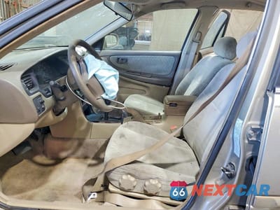 Zdjęcie 7 z 13 samochodu: 2000 NISSAN ALTIMA XE VIN:1N4DL01D0YC165184 - miniatura
