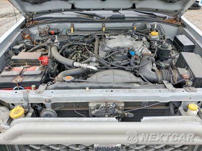 Zdjęcie 12 z 13 samochodu: 1999 NISSAN PATHFINDER XE VIN:JN8AR07Y2XW352420 - miniatura
