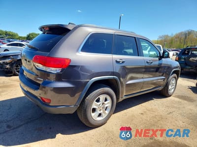 Trzecie zdjęcie samochodu z tyłu: 2016 JEEP GRAND CHEROKEE LAREDO VIN:1C4RJFAG8GC389983 - miniatura