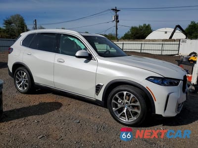 Czwarte zdjęcie samochodu z boku: 2026 BMW X5 XDRIVE40I VIN:5UX23EU0XT9229646 - miniatura