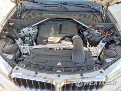Zdjęcie 12 z 13 samochodu: 2014 BMW X5 SDRIVE35I VIN:5UXKR2C52E0H33452 - miniatura