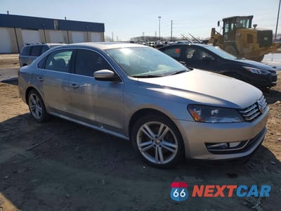 Czwarte zdjęcie samochodu z boku: 2014 VOLKSWAGEN PASSAT SE VIN:1VWBN7A34EC110175 - miniatura