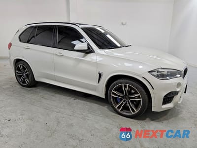Czwarte zdjęcie samochodu z boku: 2016 BMW X5 M VIN:5YMKT6C54G0R78335 - miniatura