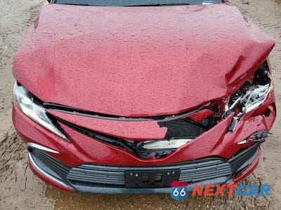 Zdjęcie 11 z 12 samochodu: 2021 TOYOTA CAMRY HYBRID LE VIN:4T1C31AKXMU031115 - miniatura
