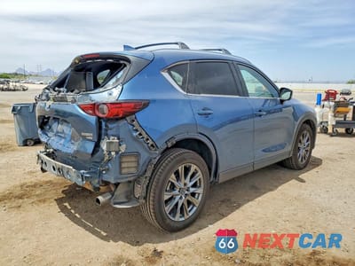 Trzecie zdjęcie samochodu z tyłu: 2021 MAZDA CX-5 SIGNATURE VIN:JM3KFBEY7M0396507 - miniatura