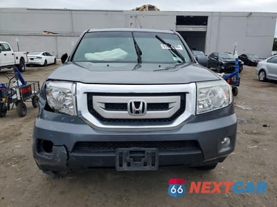 Piąte zdjęcie samochodu w środku: 2011 HONDA PILOT EXL VIN:5FNYF4H50BB076329 - miniatura