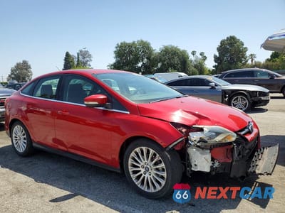 Czwarte zdjęcie samochodu z boku: 2012 FORD FOCUS TITANIUM VIN:1FAHP3J22CL429441 - miniatura