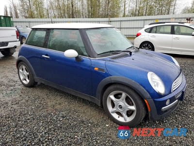 Czwarte zdjęcie samochodu z boku: 2002 MINI COOPER VIN:WMWRC33462TC32585 - miniatura