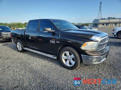 Czwarte zdjęcie samochodu z boku: 2014 RAM 1500 SLT VIN:1C6RR6LT3ES416682 - miniatura