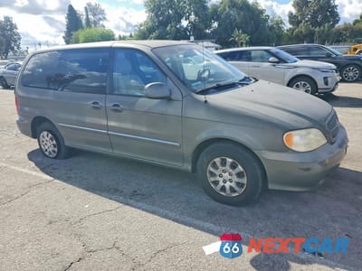 Czwarte zdjęcie samochodu z boku: 2004 KIA SEDONA LX VIN:KNDUP131946582223 - miniatura