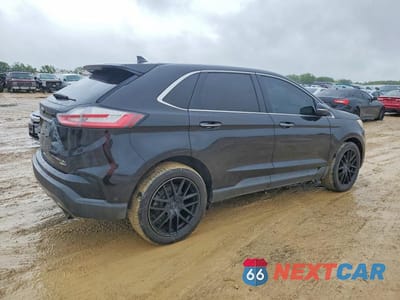 Trzecie zdjęcie samochodu z tyłu: 2019 FORD EDGE TITANIUM VIN:2FMPK4K95KBC23093 - miniatura