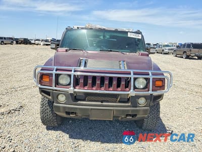 Piąte zdjęcie samochodu w środku: 2006 HUMMER H2 VIN:5GRGN23U86H111558 - miniatura