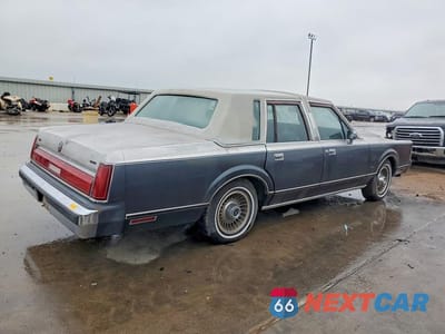 Trzecie zdjęcie samochodu z tyłu: 1985 LINCOLN TOWN CAR VIN:1LNBP96F8FY691028 - miniatura