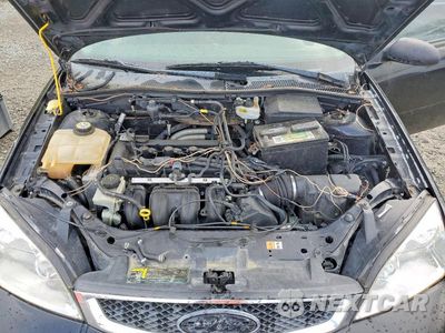 Zdjęcie 11 z 12 samochodu: 2007 FORD FOCUS ZX4 VIN:1FAFP34N97W104500 - miniatura