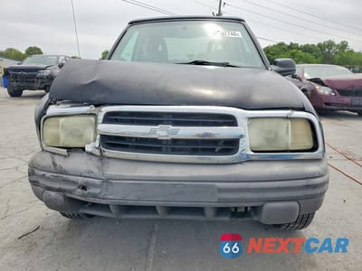 Piąte zdjęcie samochodu w środku: 2003 CHEV TRACKER VIN:2CNBE18C136908804 - miniatura