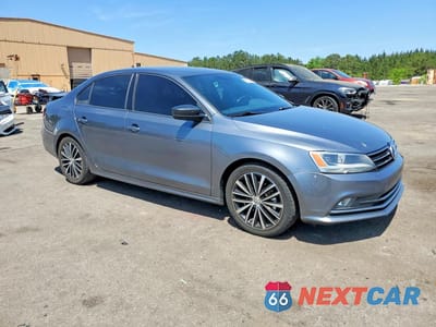 Czwarte zdjęcie samochodu z boku: 2016 VOLKSWAGEN JETTA SPORT VIN:3VWD17AJ7GM248684 - miniatura
