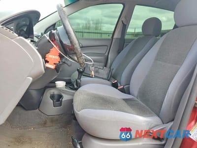Zdjęcie 7 z 13 samochodu: 2004 FORD FOCUS LX VIN:1FAFP33P14W132192 - miniatura