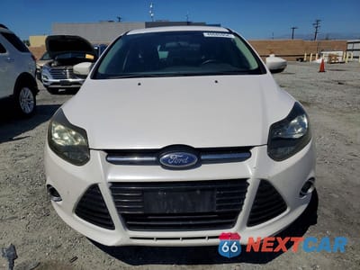 Piąte zdjęcie samochodu w środku: 2012 FORD FOCUS TITANIUM VIN:1FAHP3N26CL257926 - miniatura