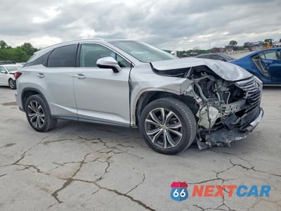 Czwarte zdjęcie samochodu z boku: 2017 LEXUS RX 350 BASE VIN:JTJBZMCAXH2018495 - miniatura